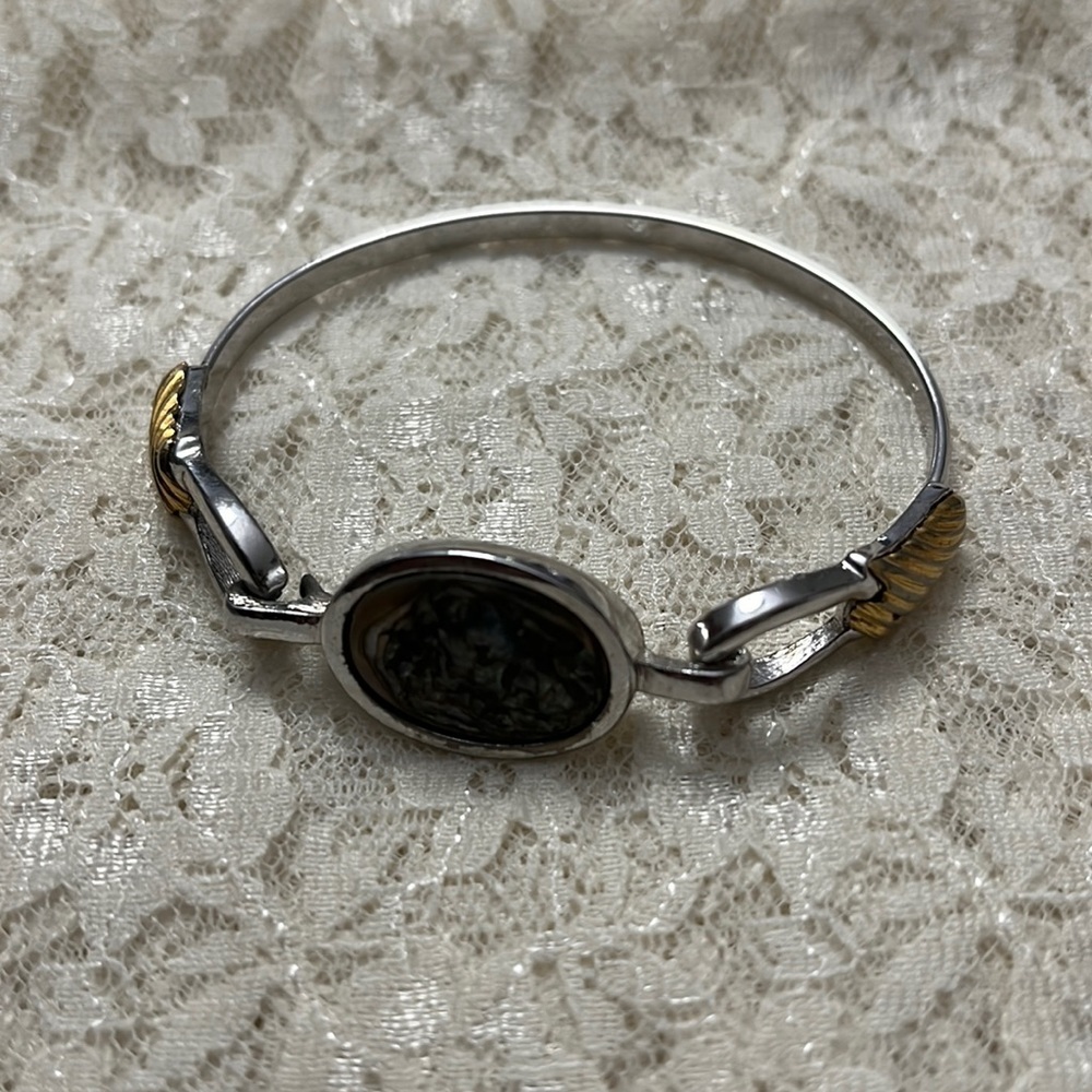 Avon/vintage silver and gold ornament bracelet